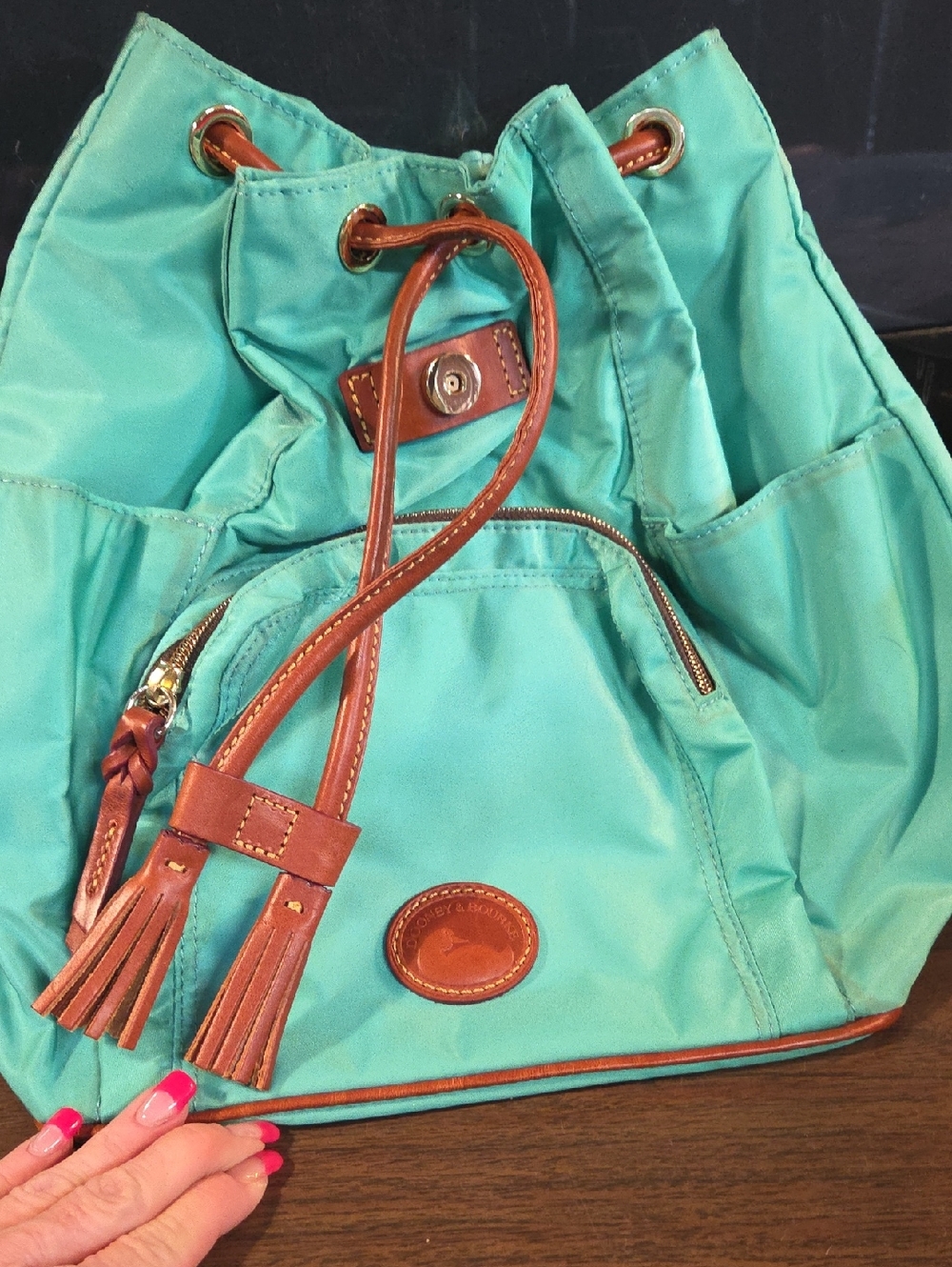 Dooney & Bourke Turquoise Drawstring Backpack with Brown Leather Trim